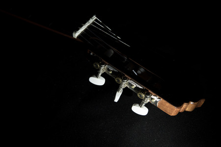 A classical guitar with six nylon strings