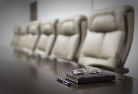 Closeup of  on table in empty corporate conference room before business meeting in officeの写真素材