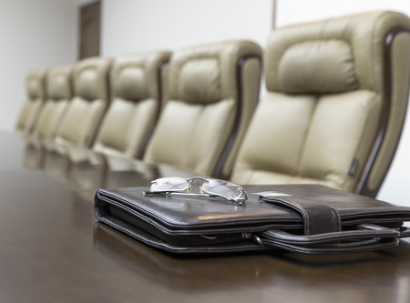 Closeup of  on table in empty corporate conference room before business meeting in officeの写真素材