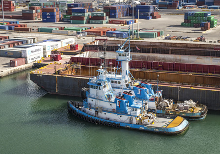 MIAMI, USA - SEPTEMBER 06, 2014 : The Port of Miami with containers and cranes on the background on September 06, 2014 in Miami.のeditorial素材