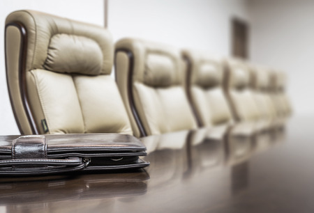 Closeup of  on table in empty corporate conference room before business meeting in officeの写真素材