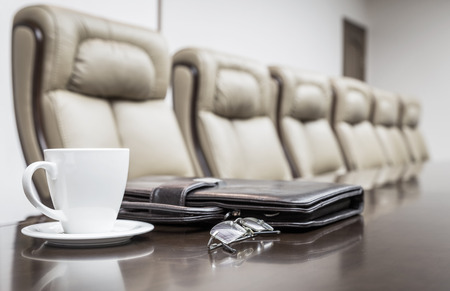 Closeup of  on table in empty corporate conference room before business meeting in officeの写真素材