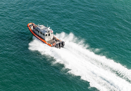 MIAMI, USA - SEPTEMBER 06, 2014 : Coast guard boat near Miami port on September 06, 2014 in Miami.のeditorial素材