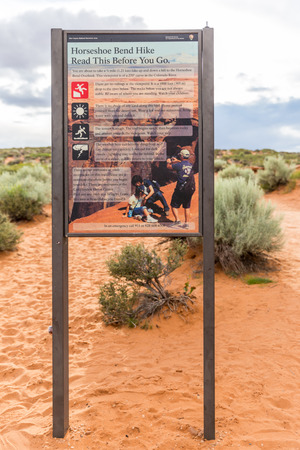PAGE, ARIZONA - MAY 25: Hikers at Horseshoe Bend on May 25, 2015 in Page AZ,USA. Thousands of people from all over the world  visit this unique place every year.のeditorial素材