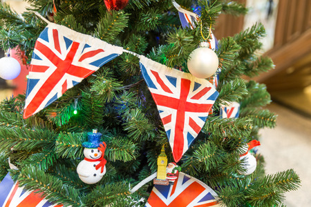 Christmas tree decoration with british flag and snowmanの写真素材