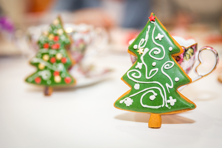 Holiday gingerbread cookie in shape of christmas treeの写真素材