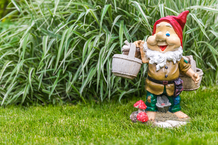 garden dwarf in home garden, nice gnome decorationの写真素材