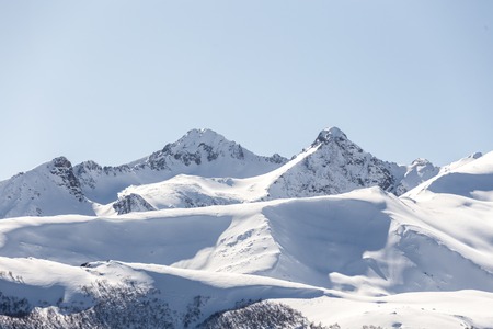Skiing high up in the mountainsの写真素材