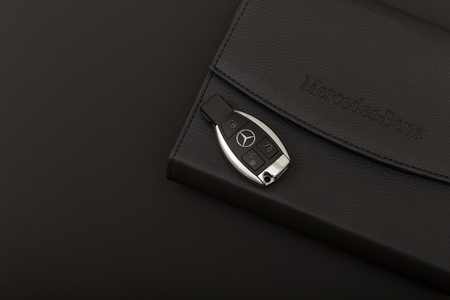 RUSSIA, MOSCOW - December 02, 2018: Mercedes Benz key with a black leather wallet
