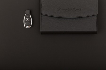 RUSSIA, MOSCOW - December 02, 2018: Mercedes Benz key with a black leather wallet