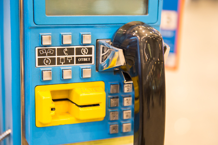 Close up of a blue modern Payphoneの写真素材