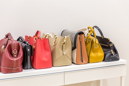 Collection of handbags standing in a rowの写真素材