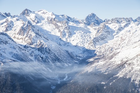 Mauntain glacier panoramic view with blue sky and snowの写真素材