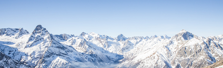 Mauntain glacier panoramic view with blue sky and snowの写真素材