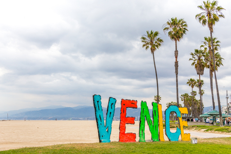 LOS ANGELES, CALIFORNIA, USA - 11 MAY, 2019: Venice beach sign on Venice beach in Los Angeles Californiaのeditorial素材