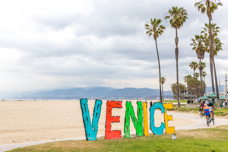 LOS ANGELES, CALIFORNIA, USA - 11 MAY, 2019: Venice beach sign on Venice beach in Los Angeles Californiaのeditorial素材