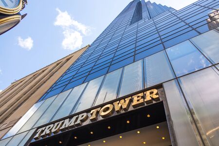 NEW YORK, USA - MAY 15, 2019: Low angle of the gold facade of Trump Tower, the skyscraper home to Trump Organization political headquarters, luxury offices and residencesのeditorial素材