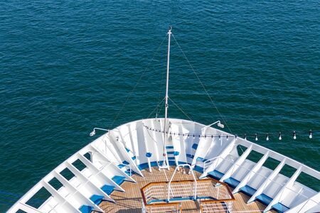 Cruise travel tourism concept - open deck with navigational equipment and pool nose ship cruise...