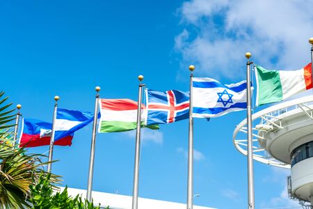 Miami, USA - September 21, 2019 - Miami international airport with flags of different countriesのeditorial素材