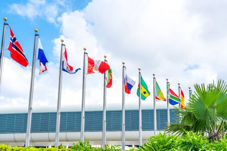 Miami, USA - September 21, 2019 - Miami international airport with flags of different countriesのeditorial素材