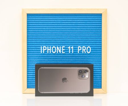Moscow, Russia - September 24, 2019: Letter board with Apple iPhone 11 proのeditorial素材