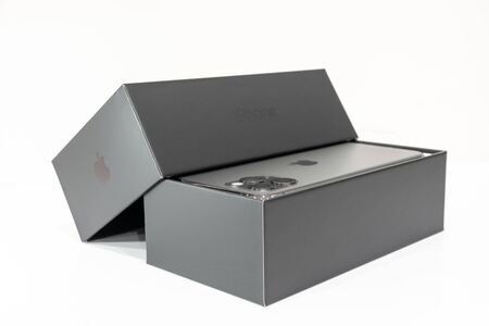 Moscow, Russia - September 24, 2019: Close up of black box of the Apple iPhone 11 pro, unboxing on white backgroundのeditorial素材