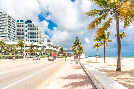 Fort Lauderdale, Florida, USA - September 20, 2019: Seafront beach promenade with palm trees on a sunny day in Fort Lauderdaleのeditorial素材