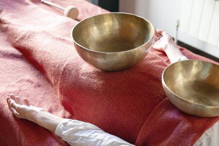 Tibetan singing bowls in sound therapy in spa center