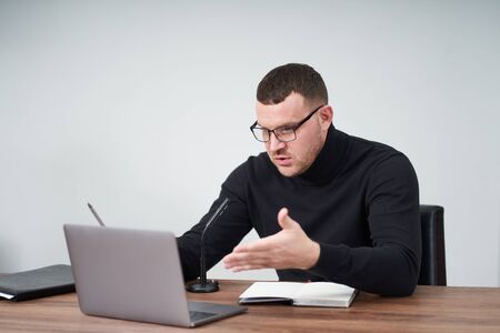 man filming video blog on camera with tripod for online followers. In social media, Influencer, new...
