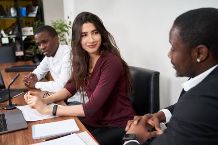 Young happy business people working together in modern office, multiethnic teamwork concept