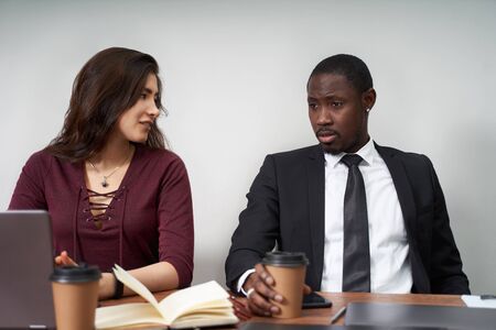 Young happy business people working together in modern office, multiethnic teamworkの写真素材