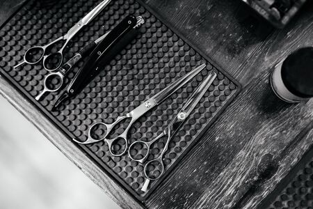 Vintage barber scissors set, black and white style, flat layの写真素材