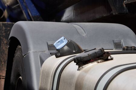 Fuel tank of a truck standing on a parking lot