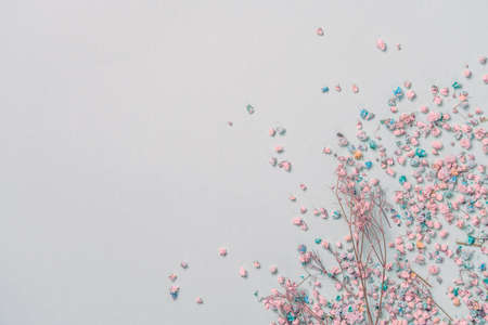 Decoration with gypsophila flowers with copy space on light green background, flat layの写真素材