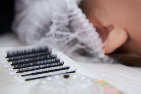Eyelash extension procedure. Lashes set of different sizesの写真素材