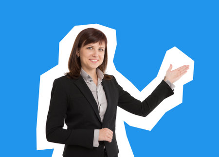 Business woman pointing at copyspace. Magazine style isolatedの写真素材