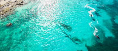 Amazing top view of jet ski. Aerial view of blue Caribbean sea. Jet ski at the sea in Cancun in Mexicoの写真素材