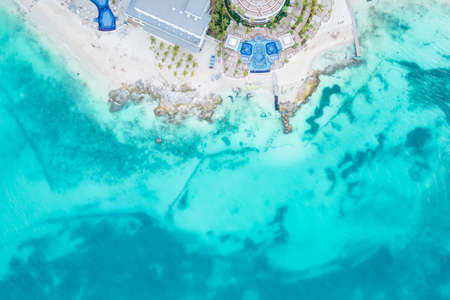 Aerial view of sandy beach and ocean with small waves in Cancun, Mexico. Top view from drone. Playa Caracol of Riviera Maya in Quintana roo region on the Yucatan Peninsulaの写真素材