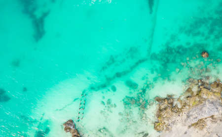 Aerial view of sandy beach and ocean with small waves in Cancun, Mexico. Top view from drone. Playa Caracol of Riviera Maya in Quintana roo region on the Yucatan Peninsulaの写真素材