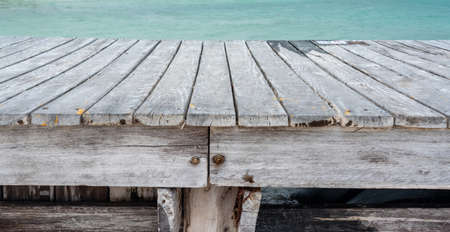 Caribbean wooden pier with turquoise aqua seaの写真素材