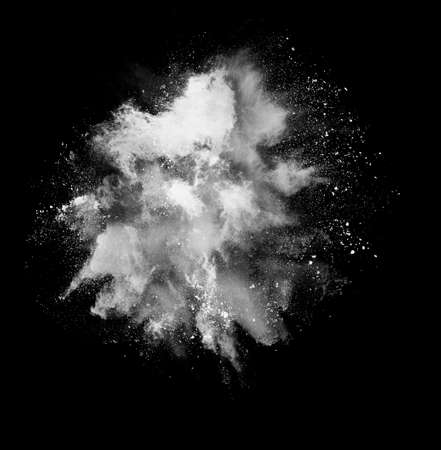 Black and white holi paint powder explosion isolated on black backgroundの写真素材