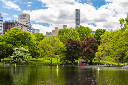 Miniature remote-controlled sail boat in Conservatory Water pond in the Central Park, New Yorkの写真素材