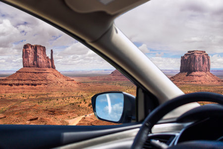 Monument Valley, popular turistic place in Utah, USA, view through car window