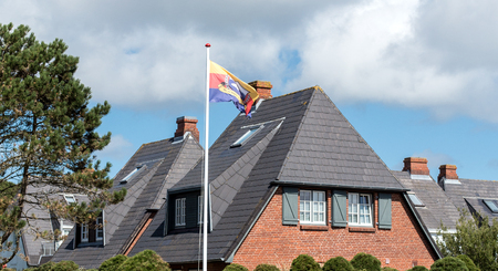 the roof of the house with nice windowの写真素材