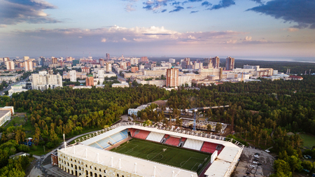 Aerial panoramic drone view of city center with huge park area and sport stadium for young people, Chelyabinsk, Russiaの写真素材