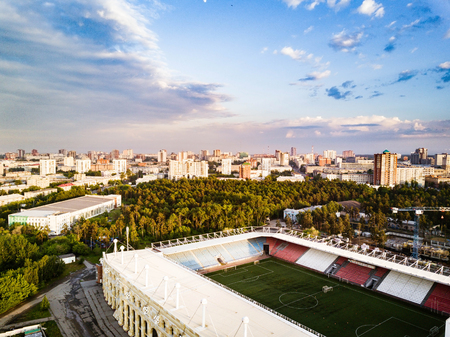 Aerial panoramic drone view of city center with huge park area and sport stadium for young people, Chelyabinsk, Russiaの写真素材