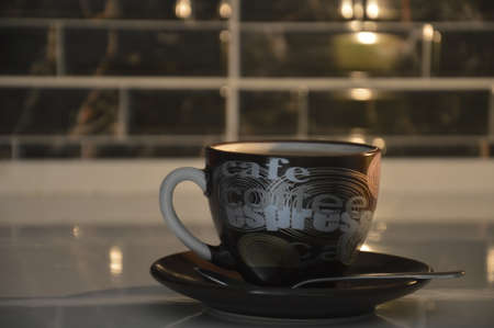 Cup of coffee on the marble table