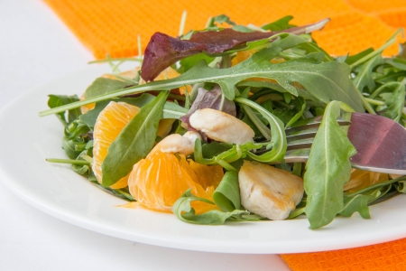 Salad with lettuce, chicken and tangerines の写真素材