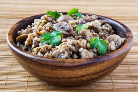 Russian traditional buckwheat with mushrooms and parsley の写真素材