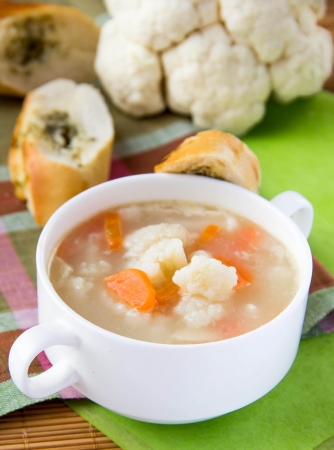 Vegetable soup with cauliflower and carrots の写真素材